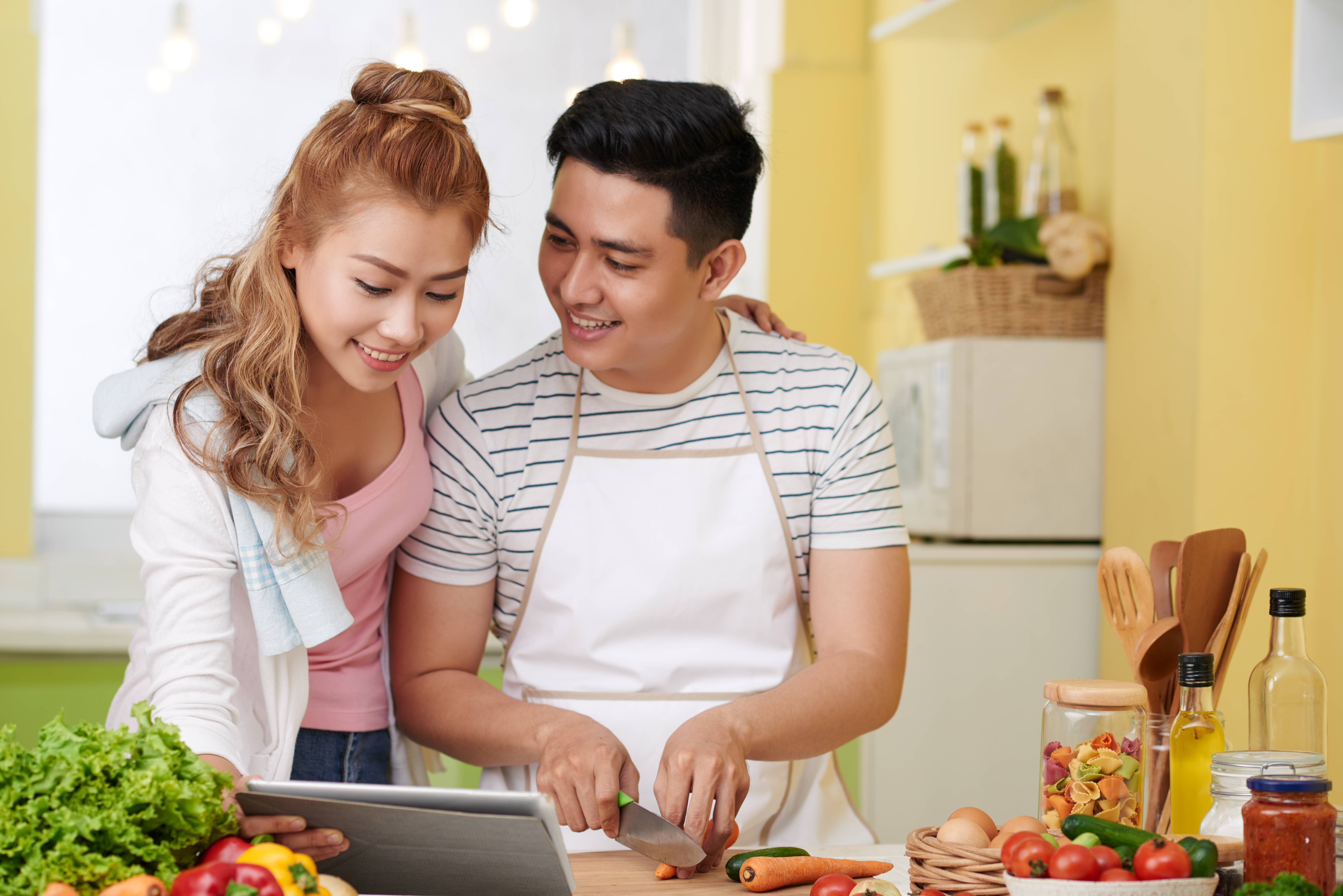 Couple following meal recipe